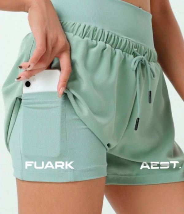 SHORT TECH WOMAN MOD TRAINING FUARK VERDE